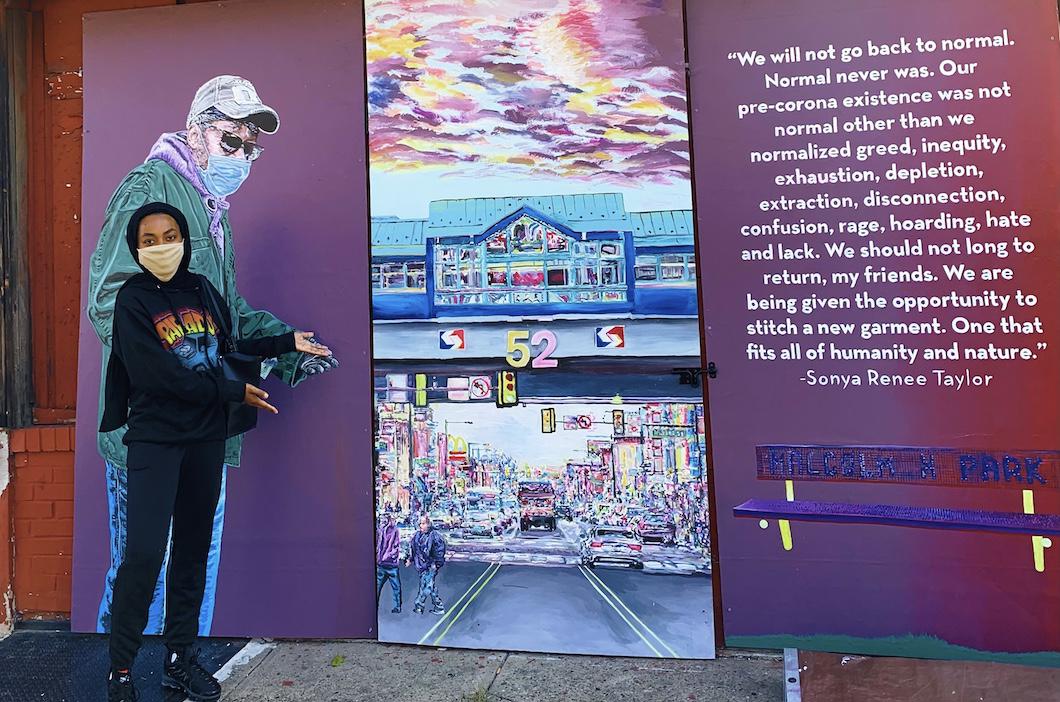Sadiyah with mural created on 52nd street by Nile Livingston, a Philadelphia-based muralist