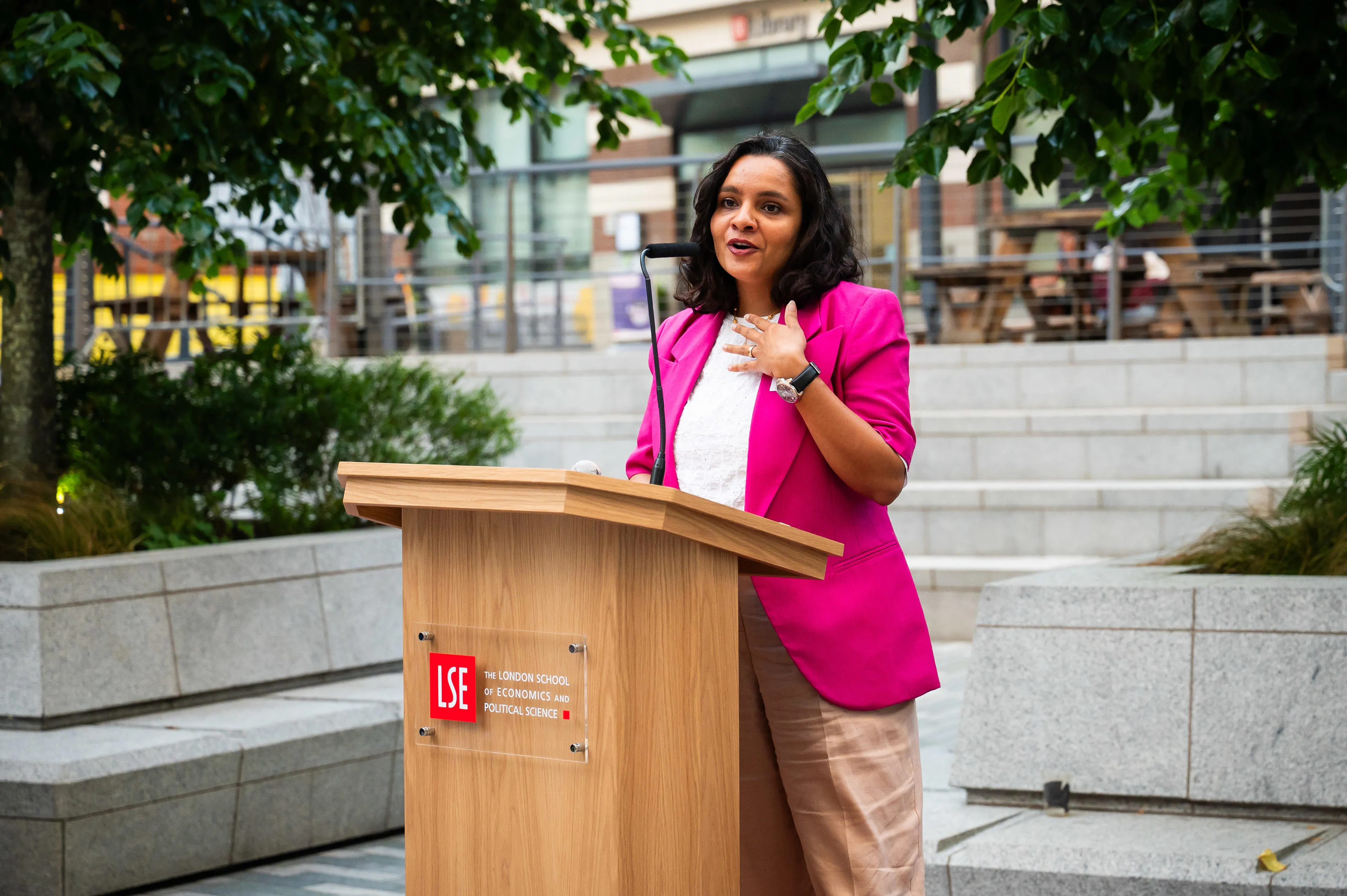Anshu Choudhary speaking at LSE podium 