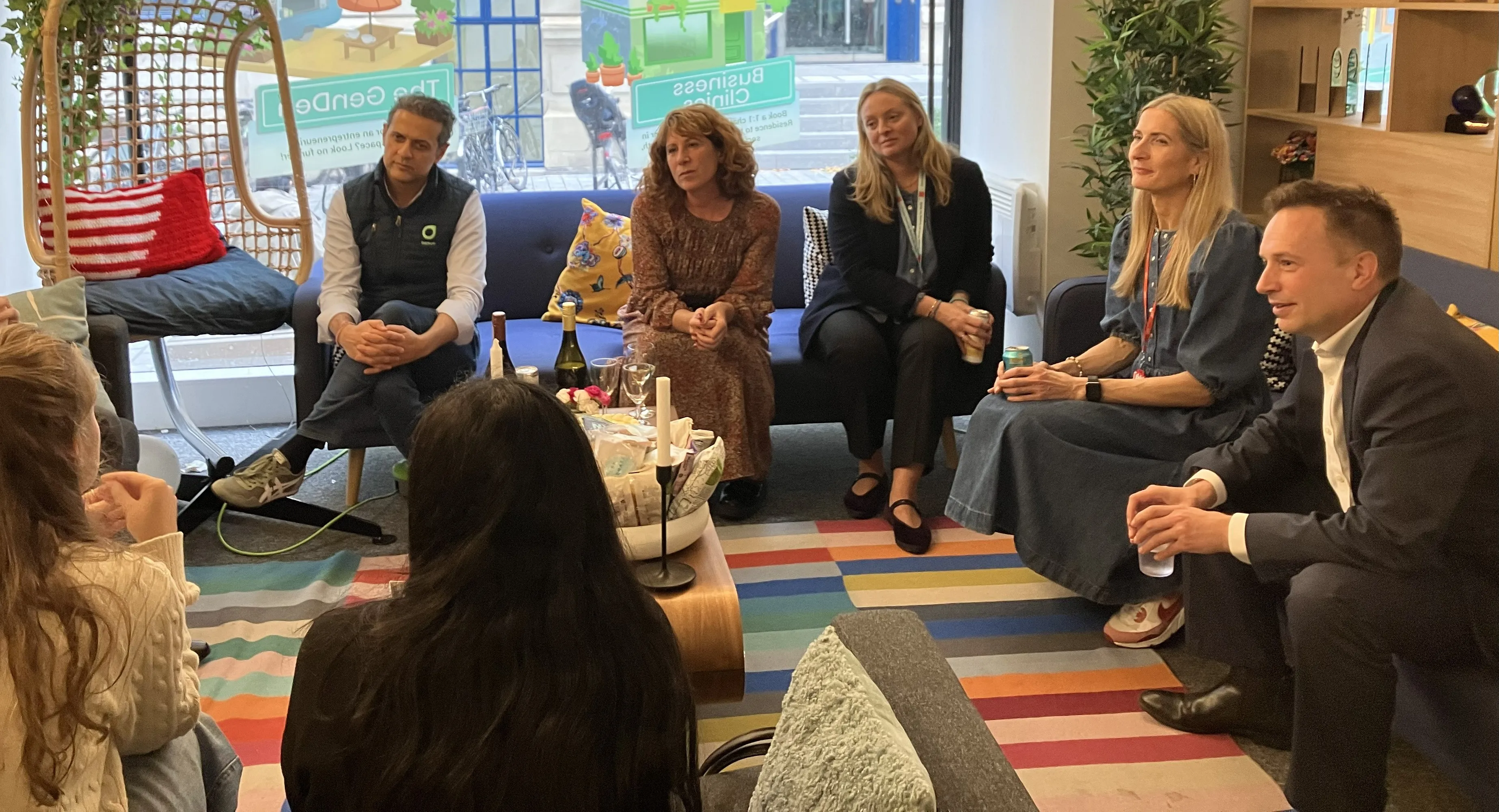 Rishi Khosla, LJ Silverman and others listening to bootcamp kids.